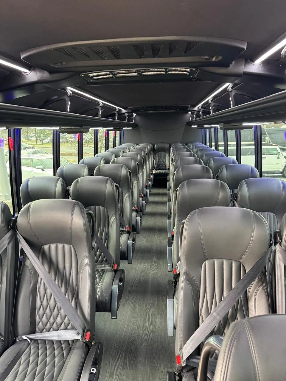 Executive mini bus interior with reclining leather captain's-chair seating, Smart Limo Rental DC