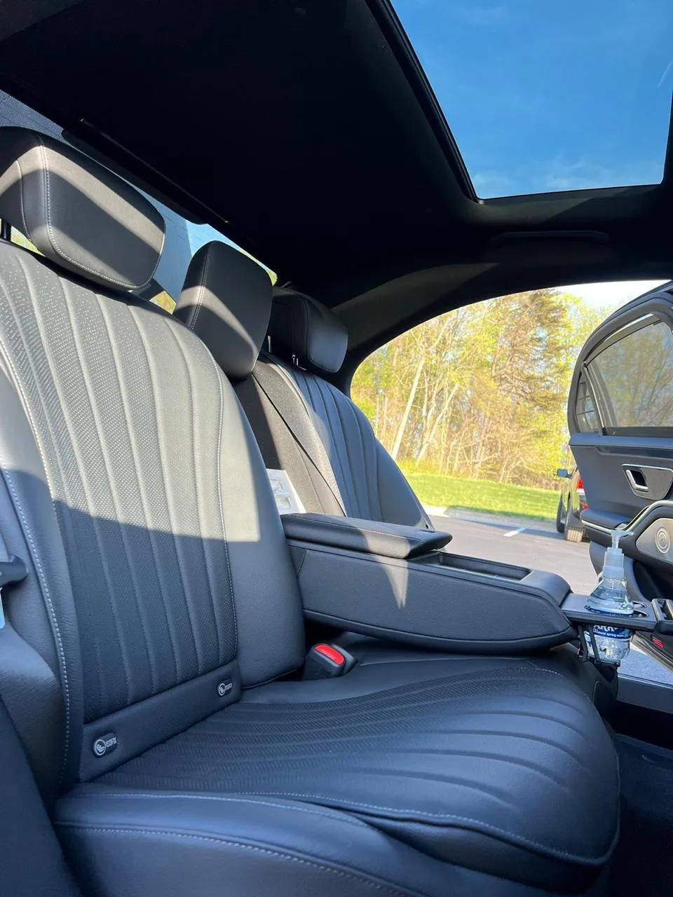 Executive sedan rear cabin with panoramic roof and legroom, Smart Limo Rental Washington DC