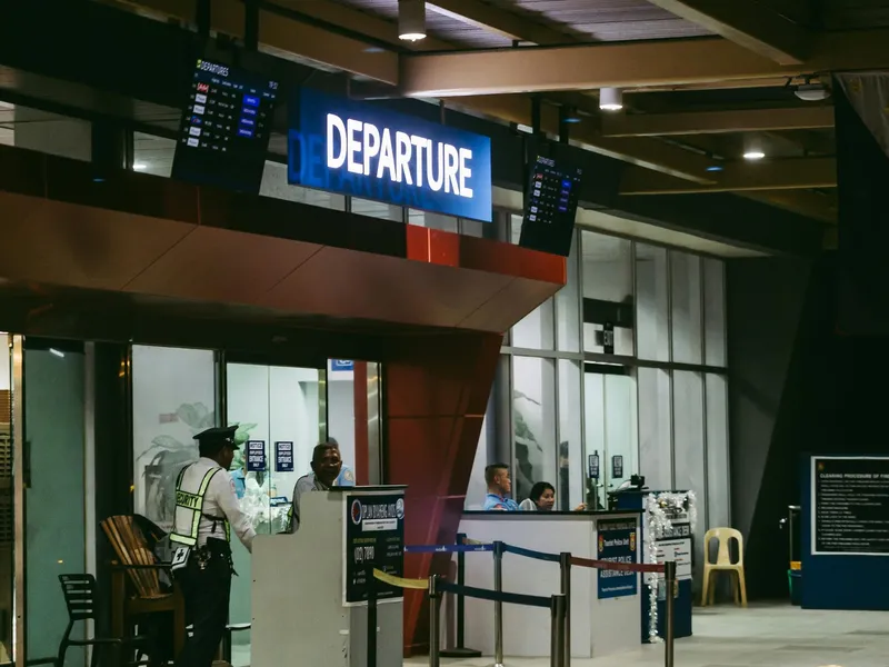 Airport terminal at night, Smart Limo Rental chauffeured airport pickup at DCA, IAD, and BWI as part of a Washington DC tour or hourly booking