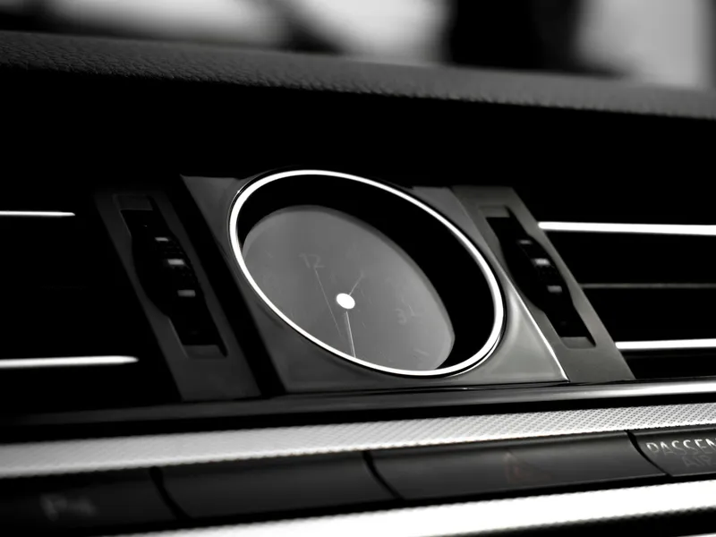Luxury sedan dashboard analog clock, Smart Limo Rental hourly chauffeur service in Washington DC
