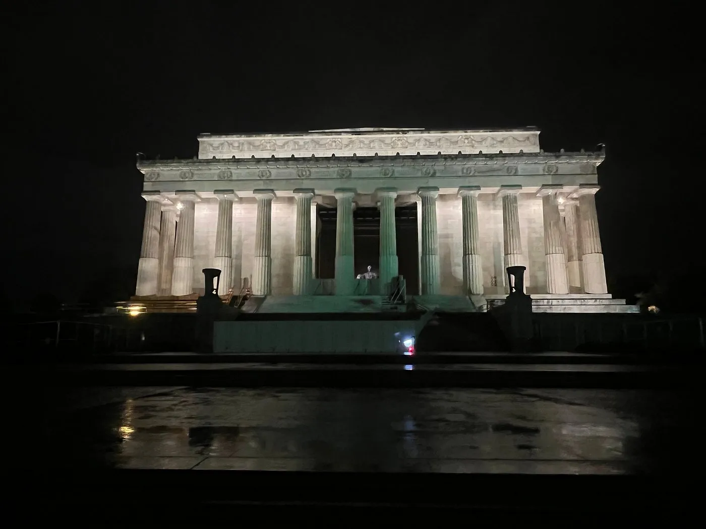 Lincoln Memorial at night, lit up at the head of the Reflecting Pool