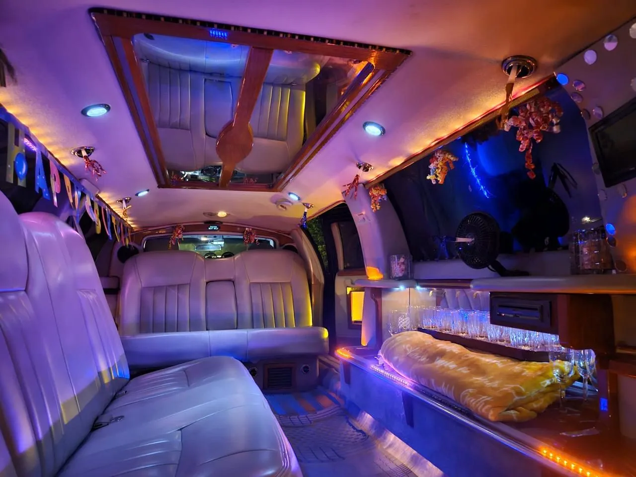 Stretch limo interior decorated for a birthday celebration with champagne bar, Smart Limo Rental DC