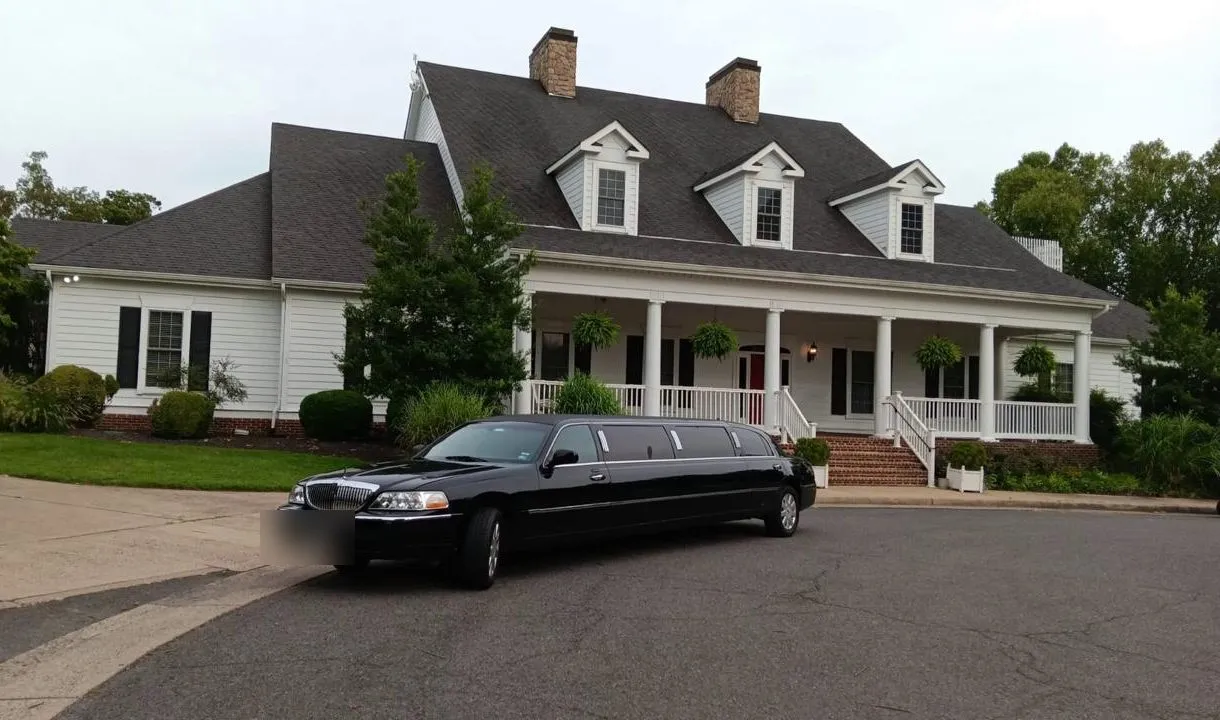 Lincoln stretch limousine at a wedding venue entrance, Smart Limo Rental DC fleet