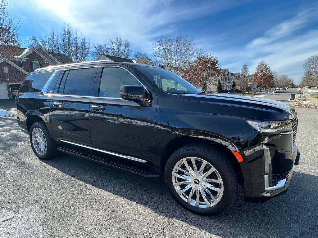 Black executive SUV side profile, Smart Limo Rental DC (Cadillac Escalade shown)