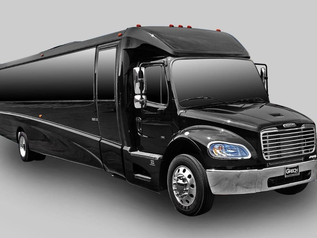 Black mini bus for convention group transport from Gaylord National at National Harbor MD